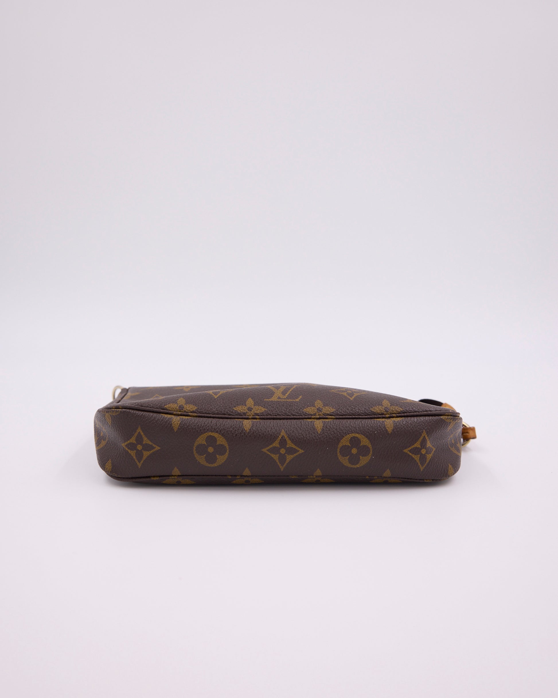 LOUIS VUITTON Pochette Accessoires Monogram Canvas braune Clutch aus Monogram Canvas