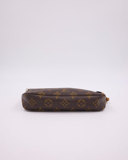 LOUIS VUITTON Pochette Accessoires Monogram Canvas braune Clutch aus Monogram Canvas
