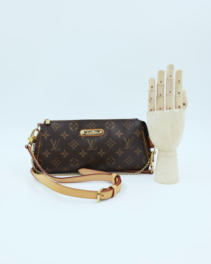 LOUIS VUITTON Pochette Eva Monogram Canvas elegante Louis Vuitton Clutch mit Monogramm Muster und Goldbeschlägen