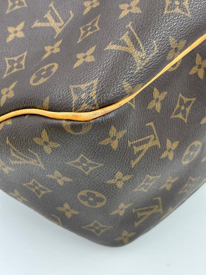 Louis Vuitton Delightful GM Monogram Canvas Tasche mit klassischem LV Muster und braunem Leder, Nahaufnahme der Oberflaeche